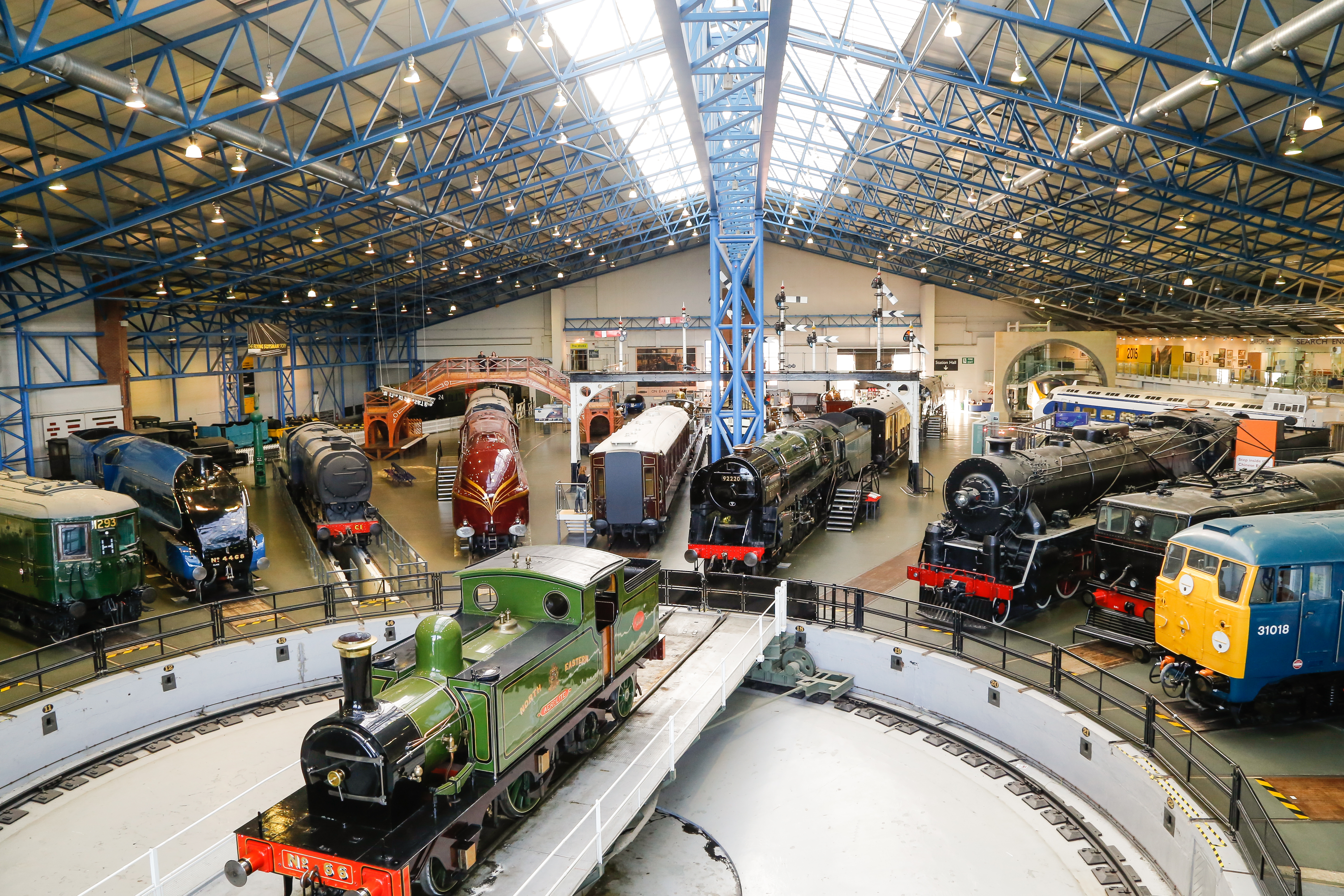 Great Hall at National Railway Museum with vintage locomotives, perfect for events and gatherings. - Banner