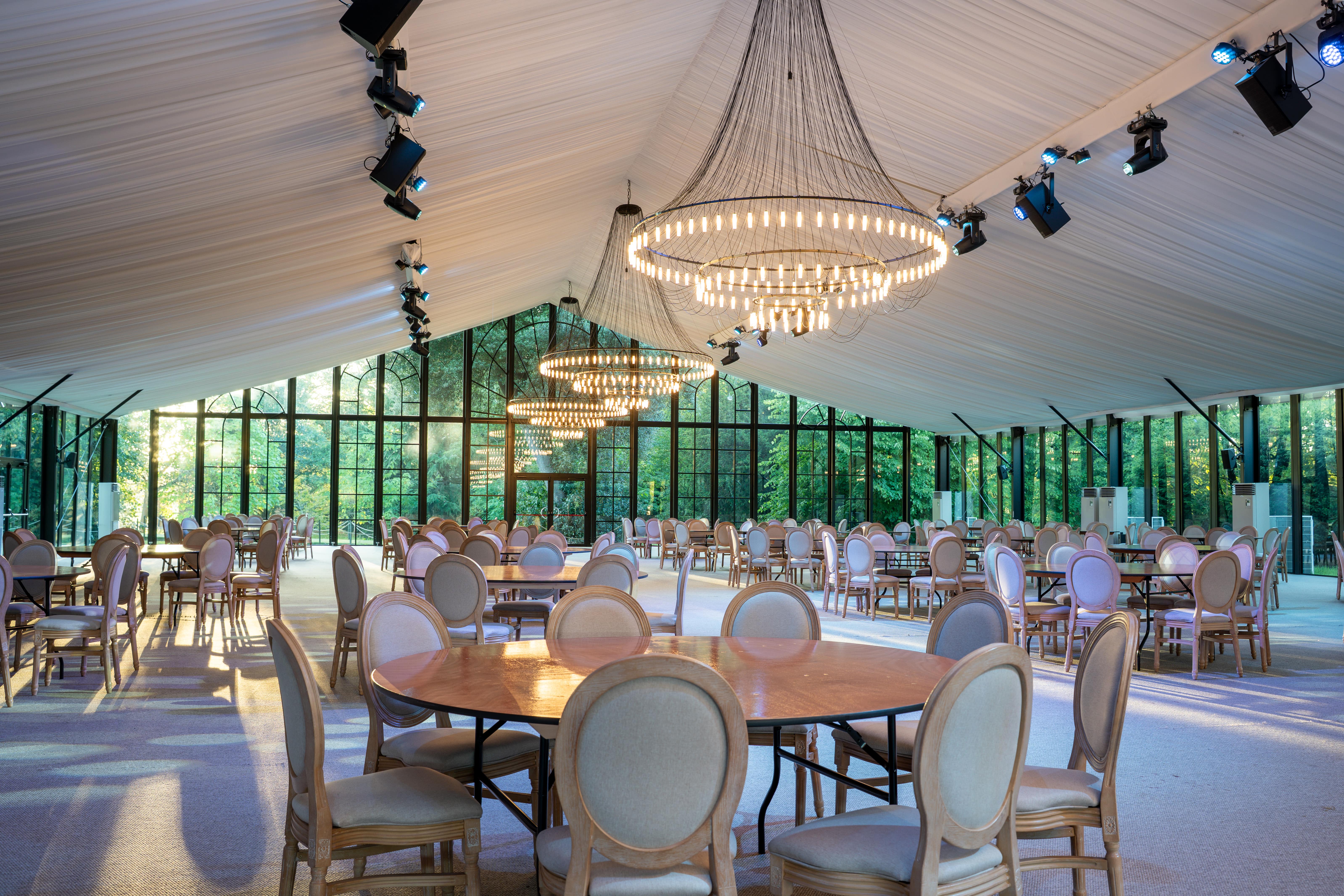 Elegant event space at The Clementine, Syon Park with chandeliers for gatherings and conferences.