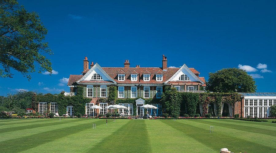Chewton Glen Hotel & Spa venue with manicured lawn for elegant meetings and events.