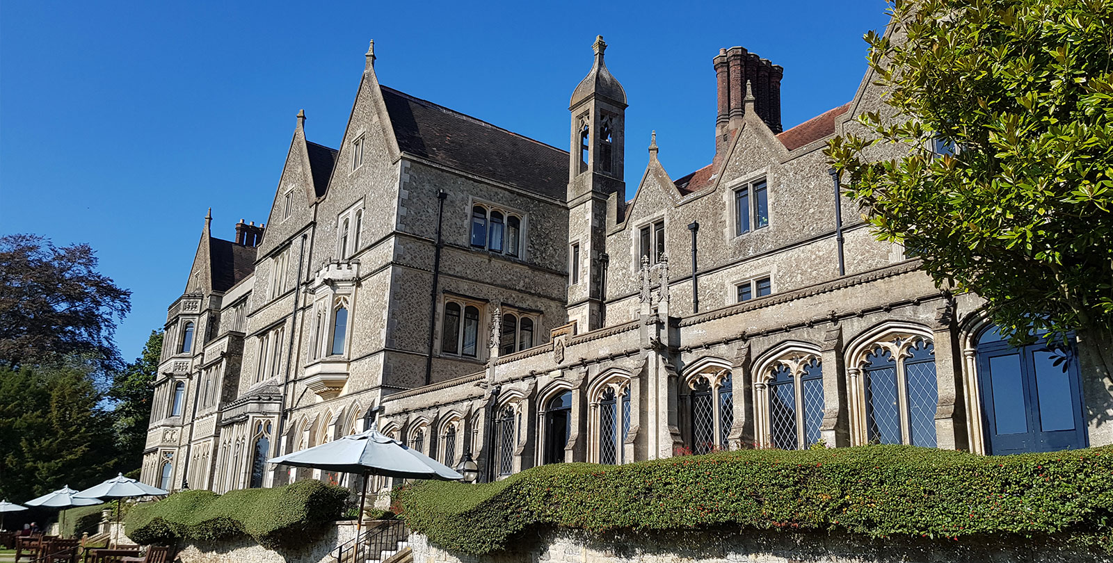 Historic Nutfield Priory venue with stunning architecture, ideal for corporate events.