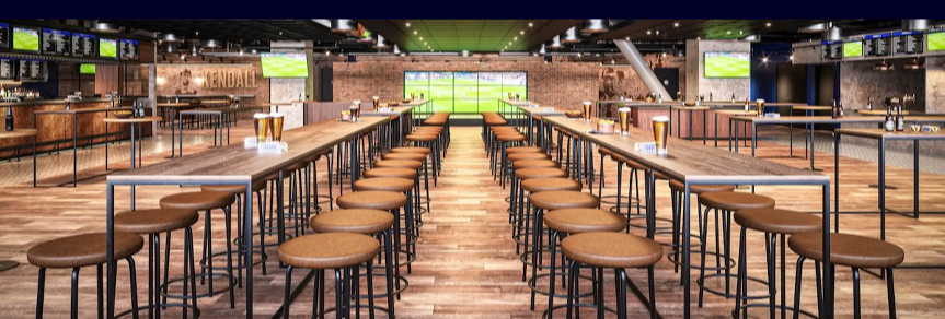 Kendall’s event space in Hill Dickinson Stadium with communal seating for corporate and gala events.