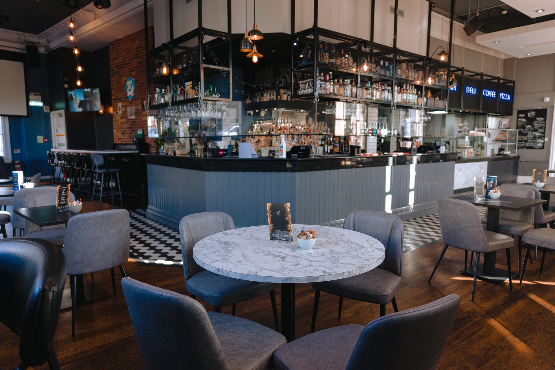 Stylish bar venue at The Thirsty Scholar, ideal for networking and casual meetings.