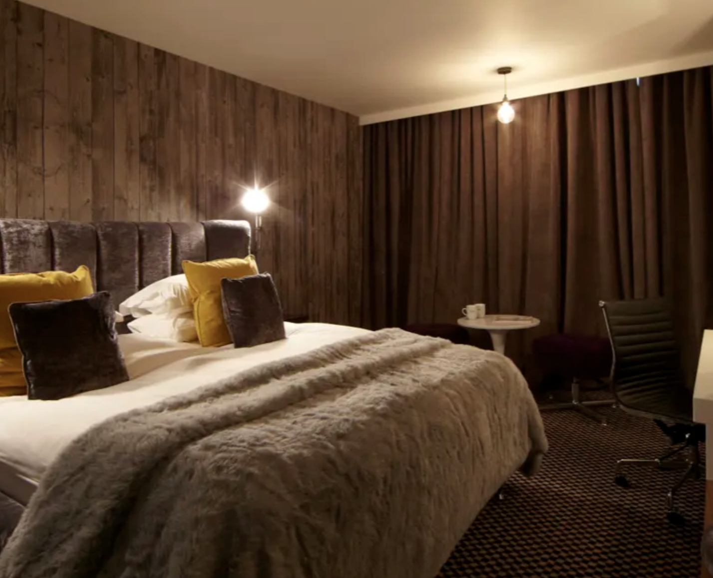 Cozy hotel room in Malmaison London, perfect for retreats and meetings.