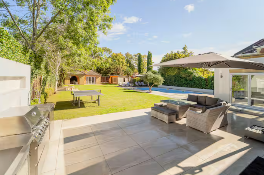 Outdoor filming location at Emerson Park Villa with lush greenery, perfect for events. - Banner