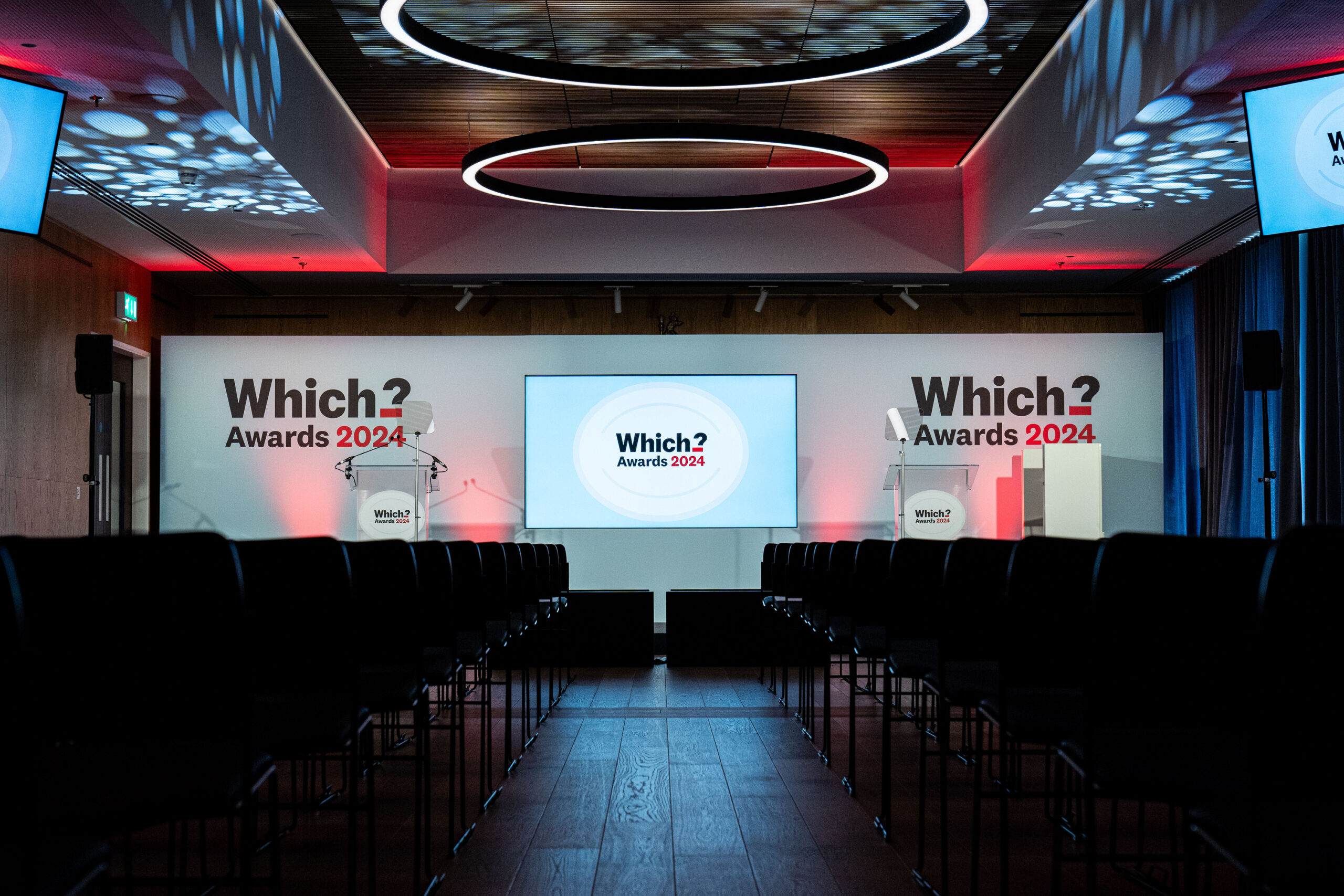 Linder Boardroom event setup with branded stage backdrop for corporate awards and presentations.