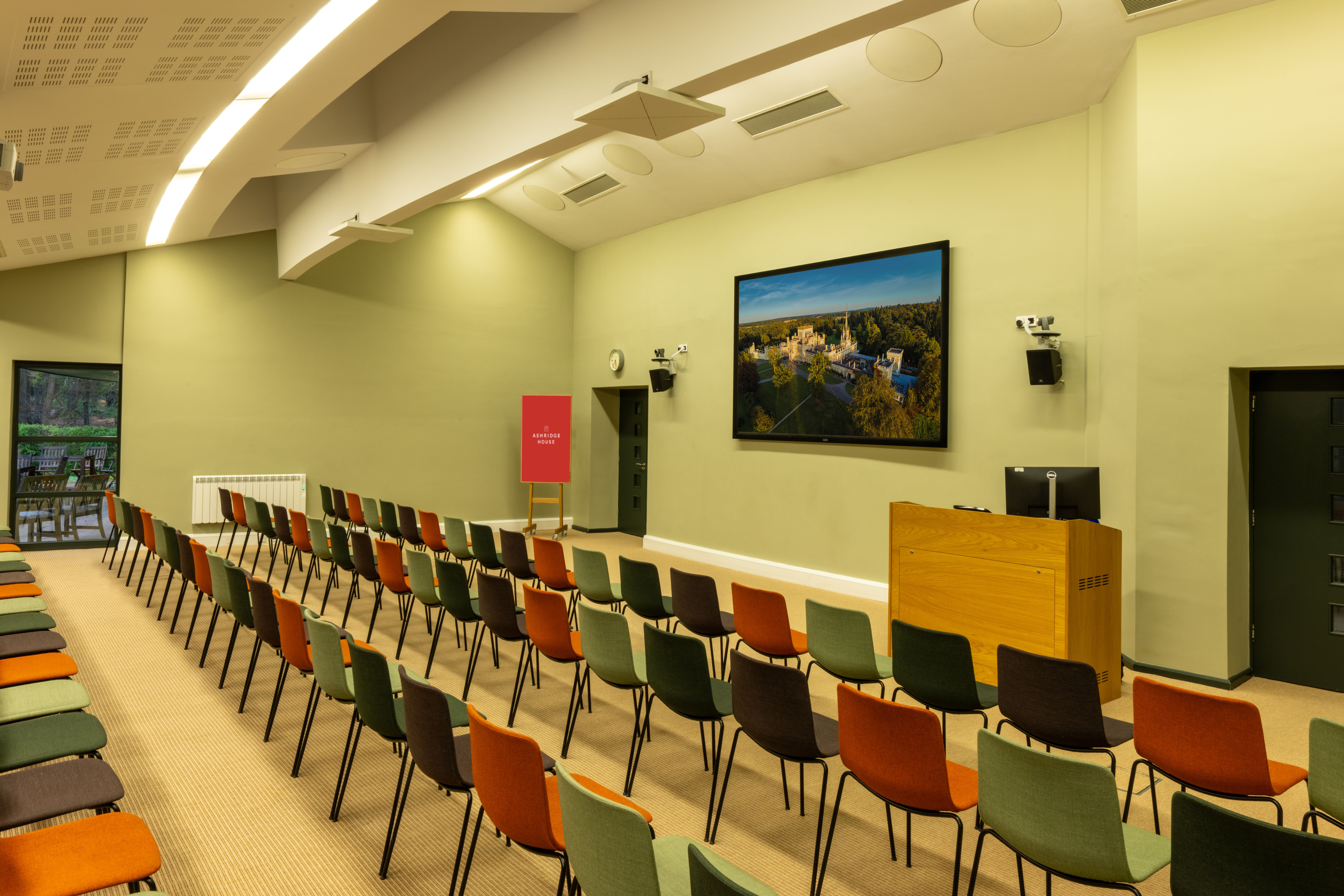 Theater-style meeting room at Ashridge House for corporate presentations and academic lectures.