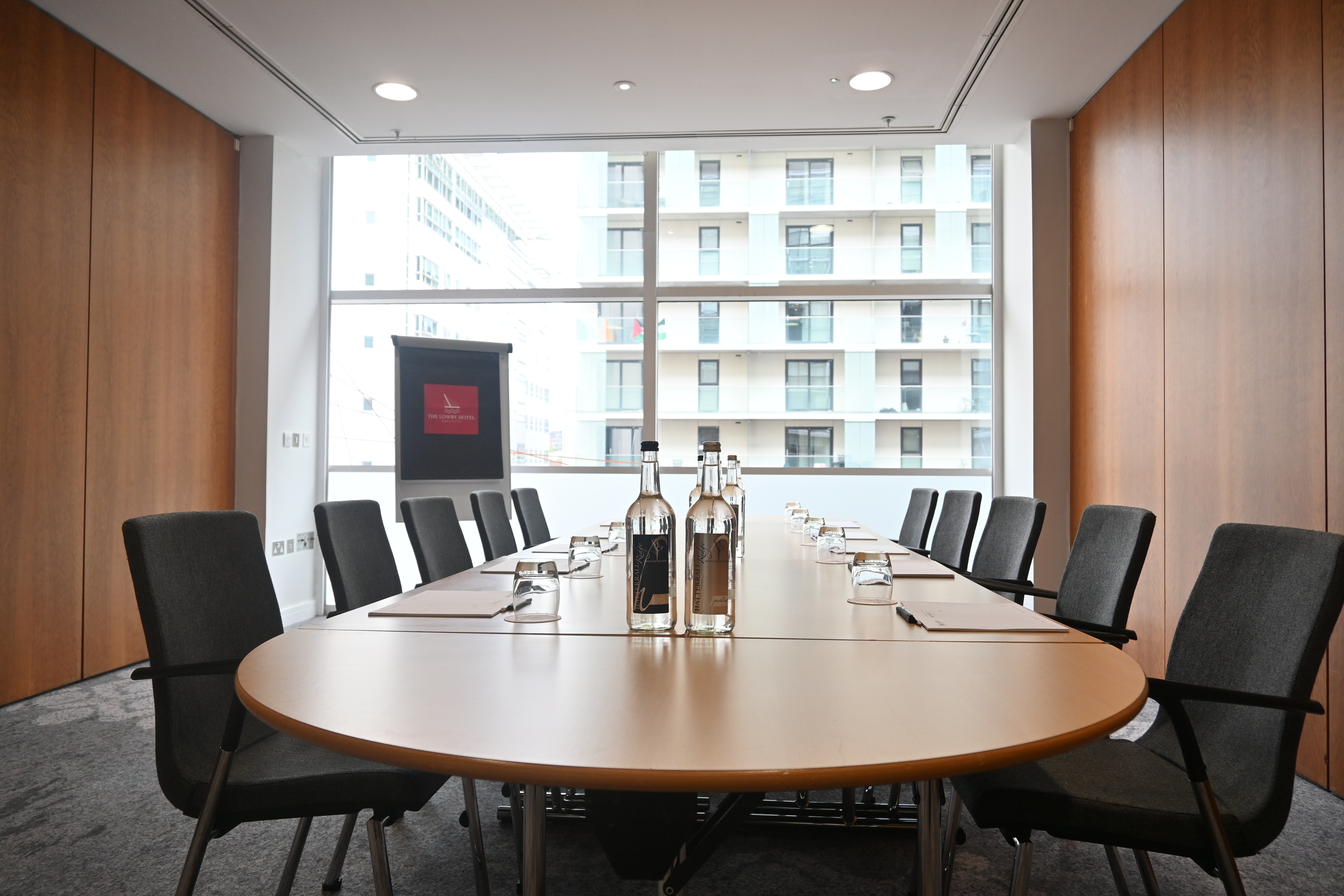 Boardroom-style Meeting Room 3 at The Lowry Hotel for small corporate meetings and professional events.