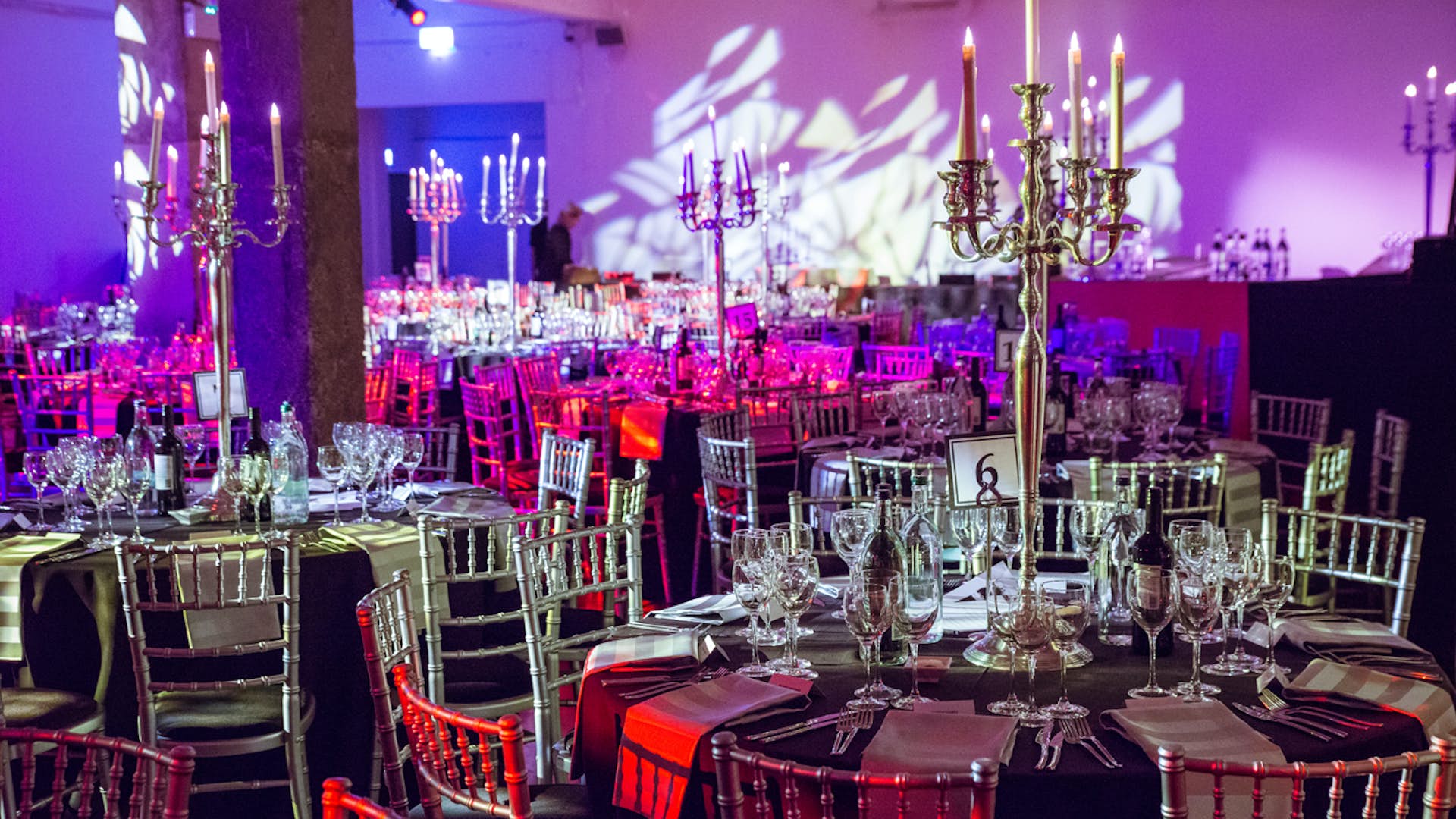 Elegant banquet hall with round tables, ideal for upscale events and galas.