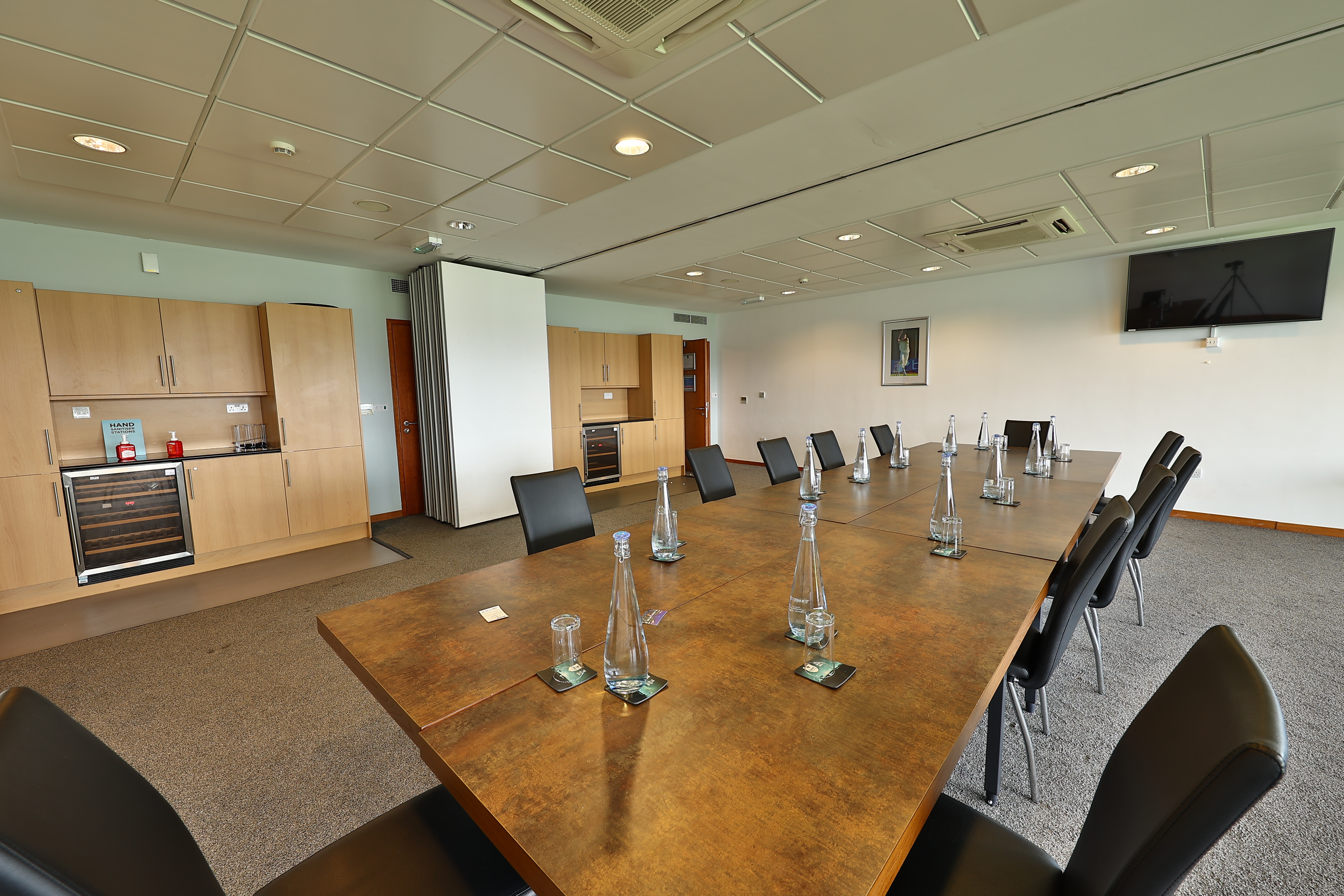 Modern conference room in Kia Oval's Double Executive Box, ideal for meetings and presentations.