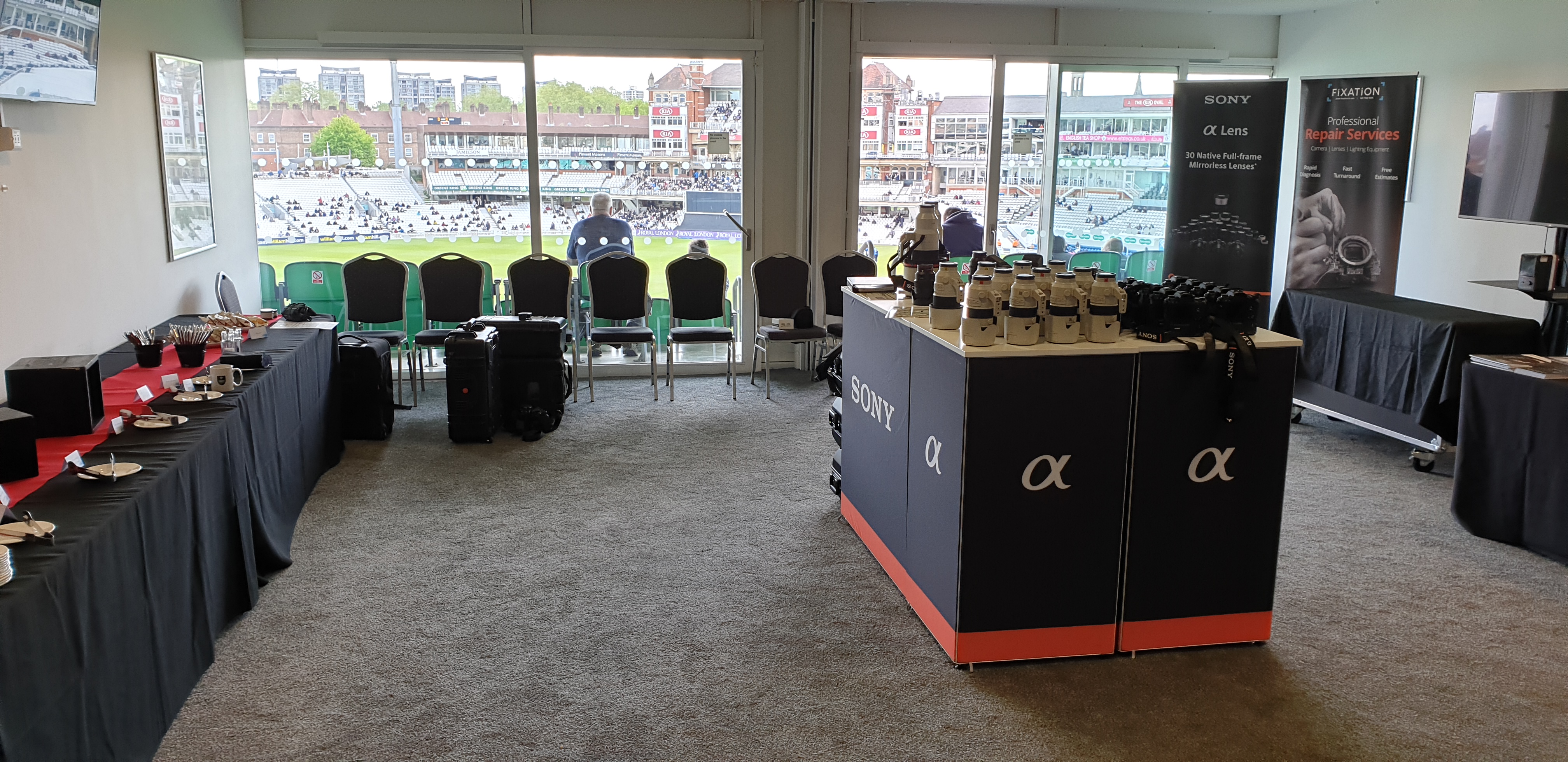 Double Executive Box at Kia Oval, sleek registration desk, event space for networking.