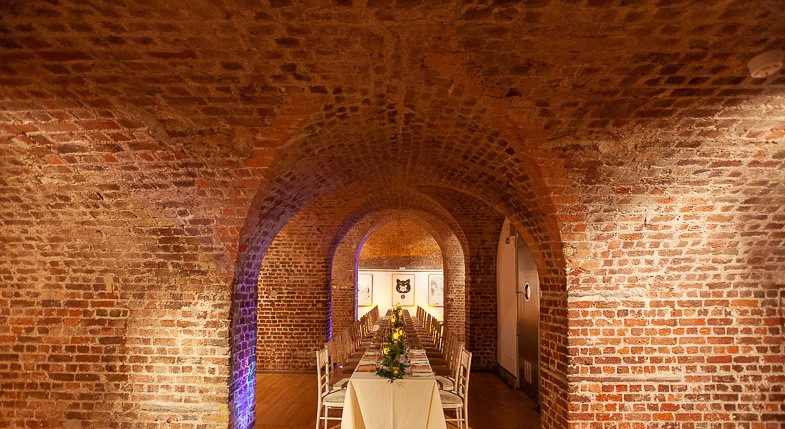 Exposed brick arches in The Vaults, RSA House, perfect for corporate dinners and celebrations.