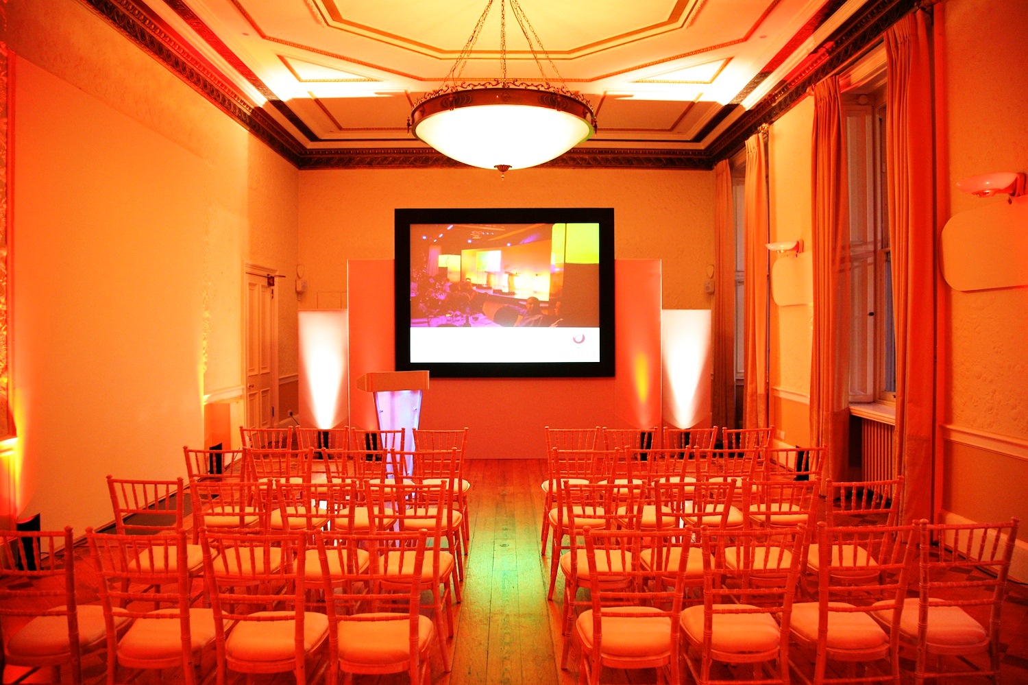 Rutland Room in Kent House: elegant meeting space with warm lighting for presentations.
