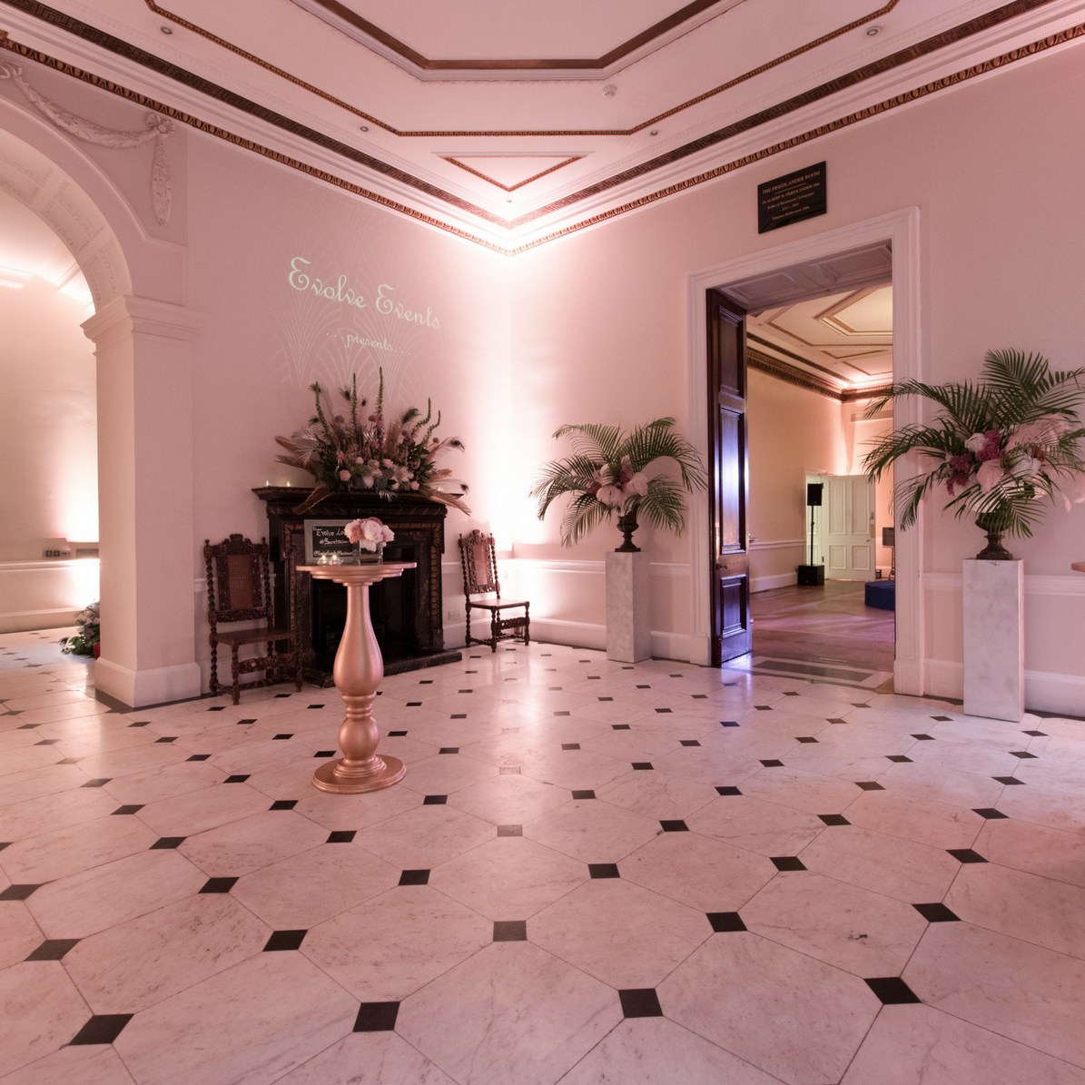 Elegant Marble Hall in Kent House, perfect for upscale events with floral decor.