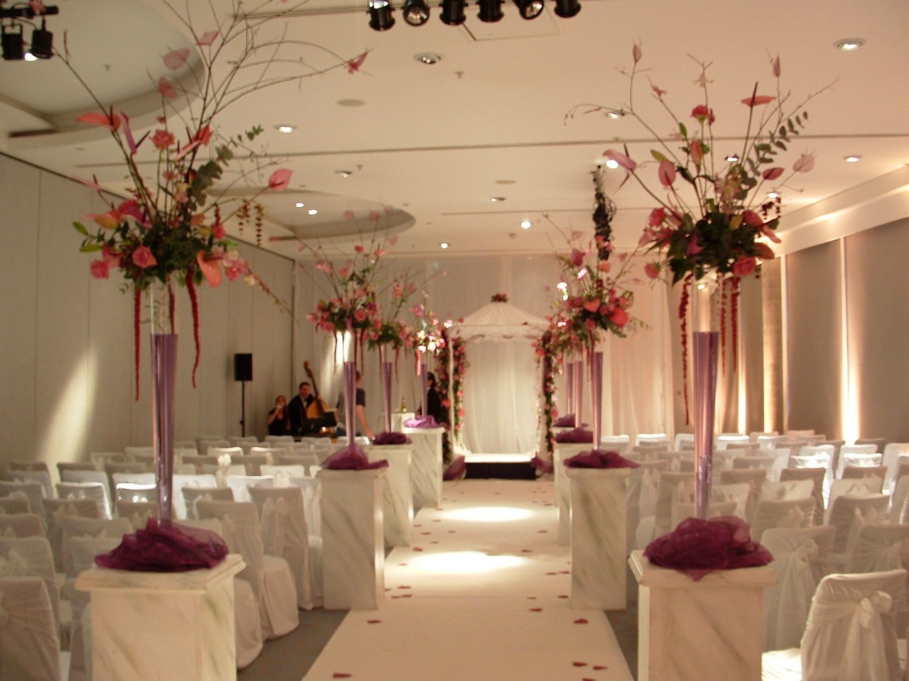 Grand Ballroom at The Lowry Hotel, elegant floral decor for romantic wedding ceremony.