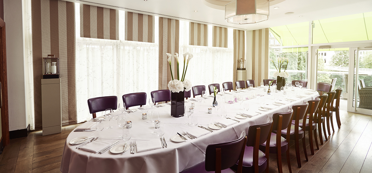 Private dining room at The Lowry Hotel, elegant table setting for meetings and events.
