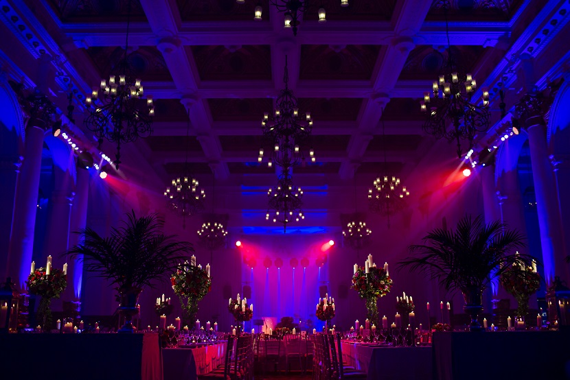 Elegant ballroom with dramatic lighting, perfect for galas and formal dinners.