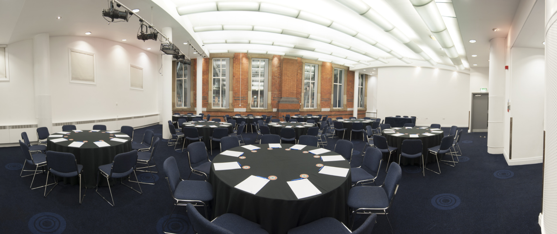 Exchange Room 11 in Manchester Central, bright event space for workshops and conferences.