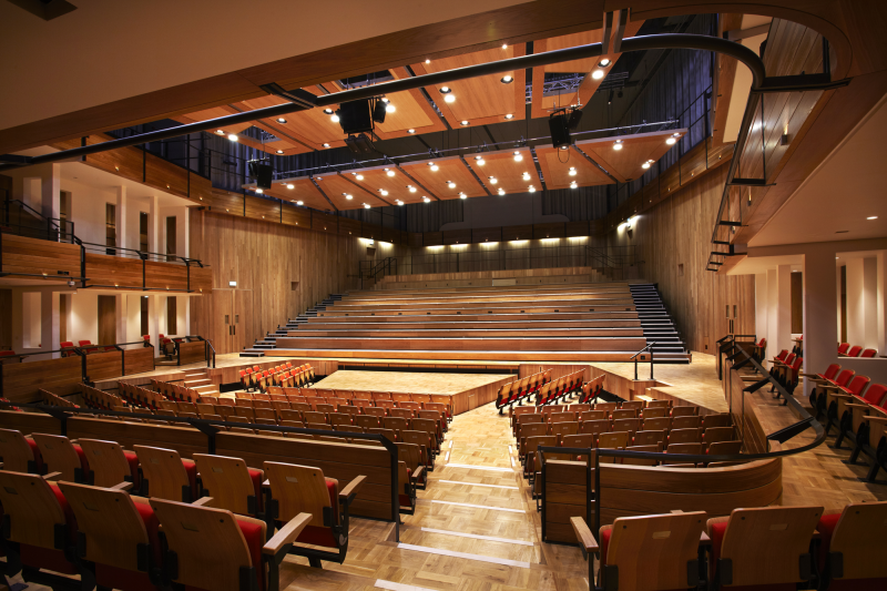 Elgar Concert Hall with tiered seating, ideal for concerts and conferences. - Banner