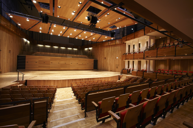 Elgar Concert Hall auditorium with wooden finishes, ideal for performances and conferences. - Banner